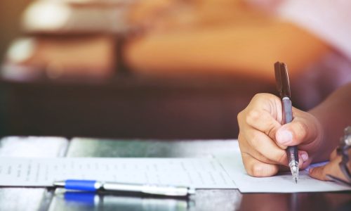Student working on High School Equivalency exam